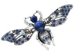 Dekorative Brosche Silberne Biene mit blauen Zirkonia