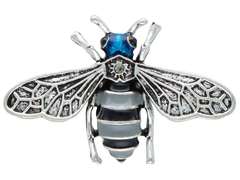 Dekorative Brosche Kleine silberne Biene mit blauem Kopf
